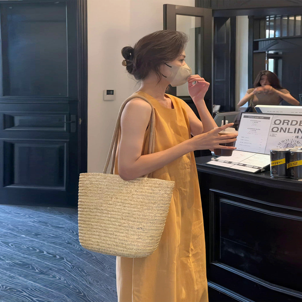 Summer sleeveless dress with a small stature and a high end feel featuring an apple shaped figure and a slimming effect exuding a casual French style vibe image 3