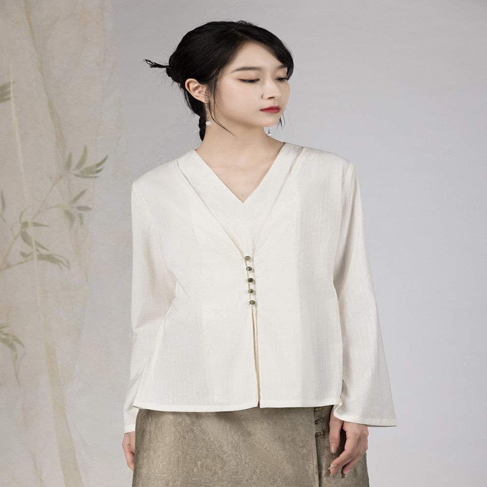 Yyan means new Chinese style white fake two piece shirt with V neck and autumn jade pearl buckle design long sleeved top for women image 3