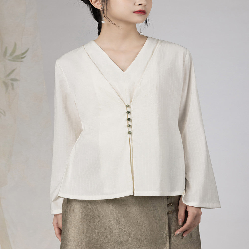 Yyan means new Chinese style white fake two piece shirt with V neck and autumn jade pearl buckle design long sleeved top for women image 5