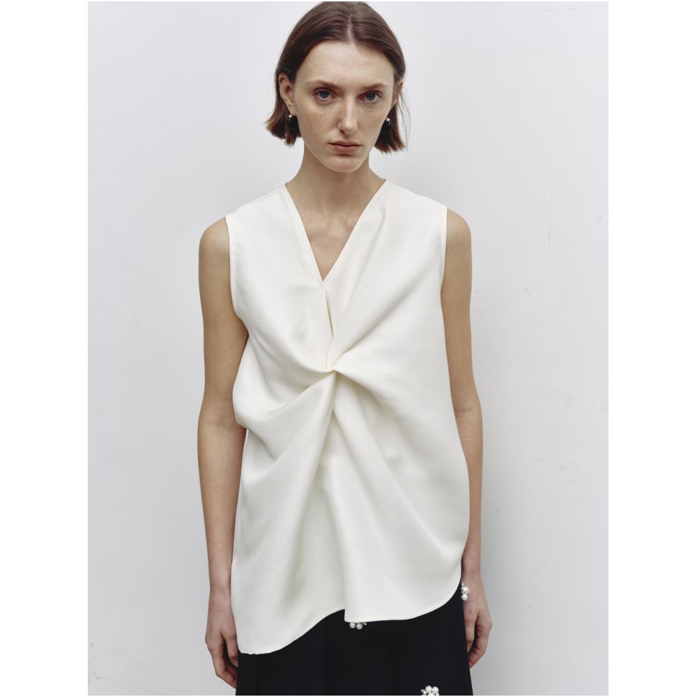 Serrer Off white asymmetrical V neck knot sleeveless top image 0