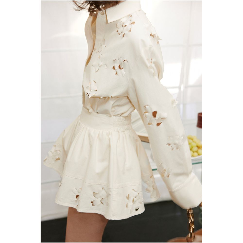 Rosebanks collection of flowers Instagram French blogger s vacation style floral cutout suit shirt skirt and pants image 1