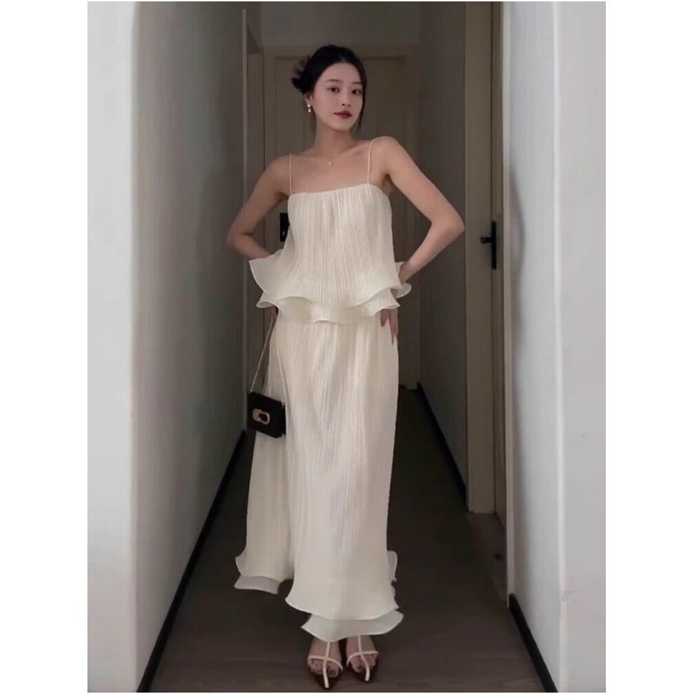 X Rose Two Piece Set A sophisticated pleated design with ruffled trim featuring a high waisted midi skirt and a camisole top image 1