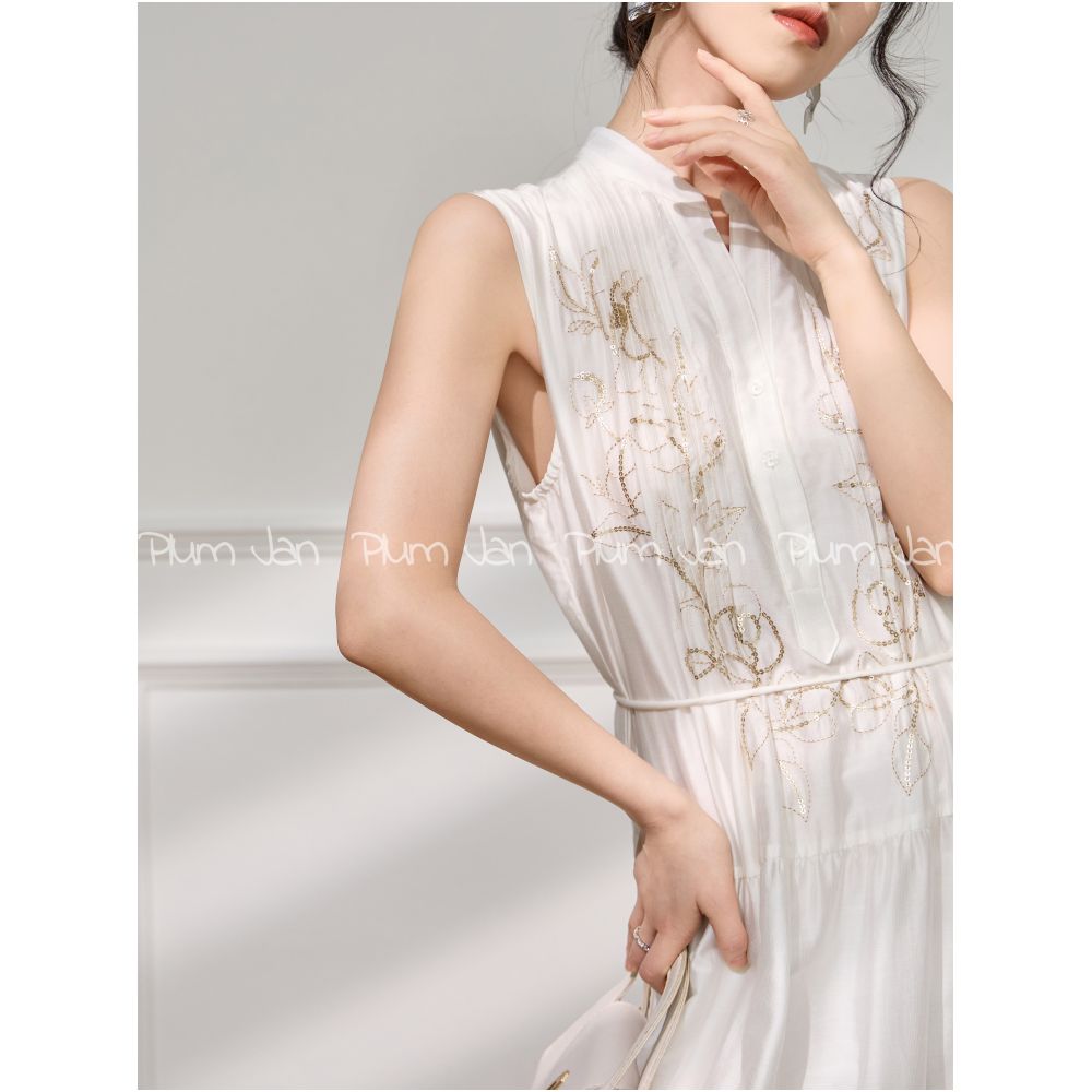 Plum Jan Beach photoshoot outfit off white sleeveless stand neck pleated dress a super pretty dress image 1
