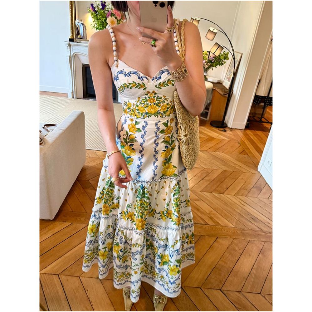 This year s trendy and unique white floral print sundress with a cinched waist is a popular summer style for women in 2025 image 1