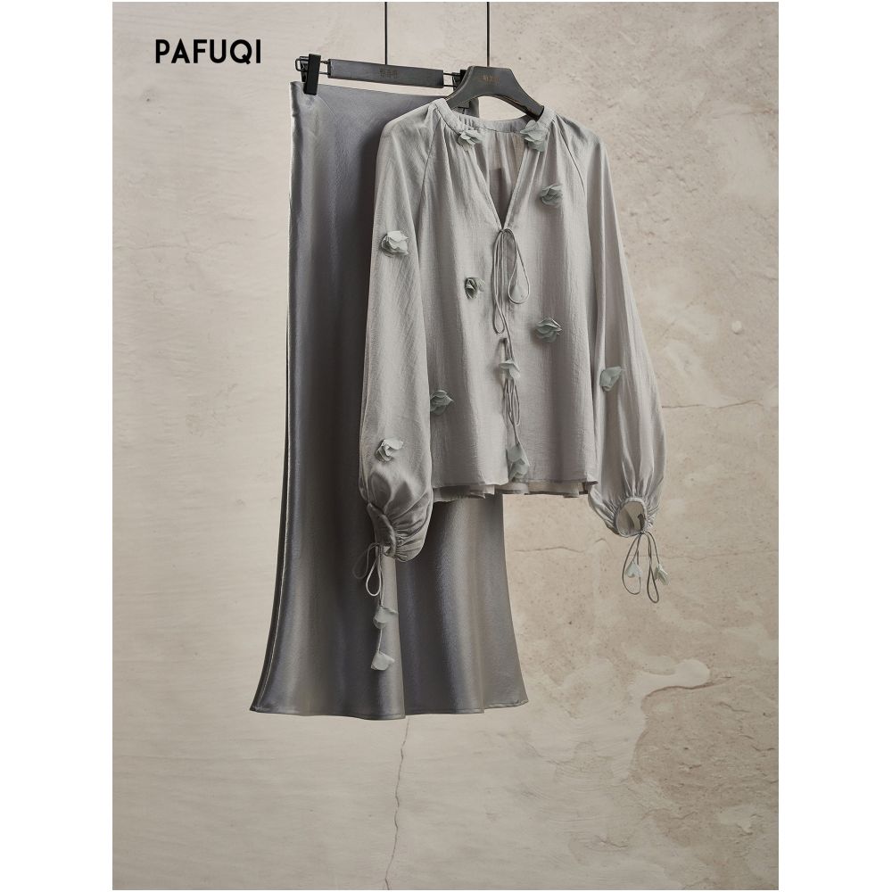 A gorgeous early spring outfit a French style lantern sleeve shirt with a V neck elegant loose fit and slimming long sleeved grey top image 0