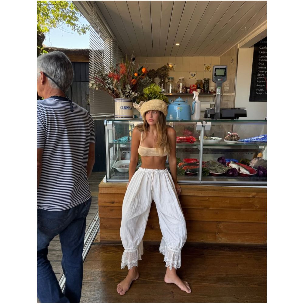 Free People white lace trimmed lantern pants casual comfortable cool slightly sheer loose fitting cropped pants perfect for summer image 0