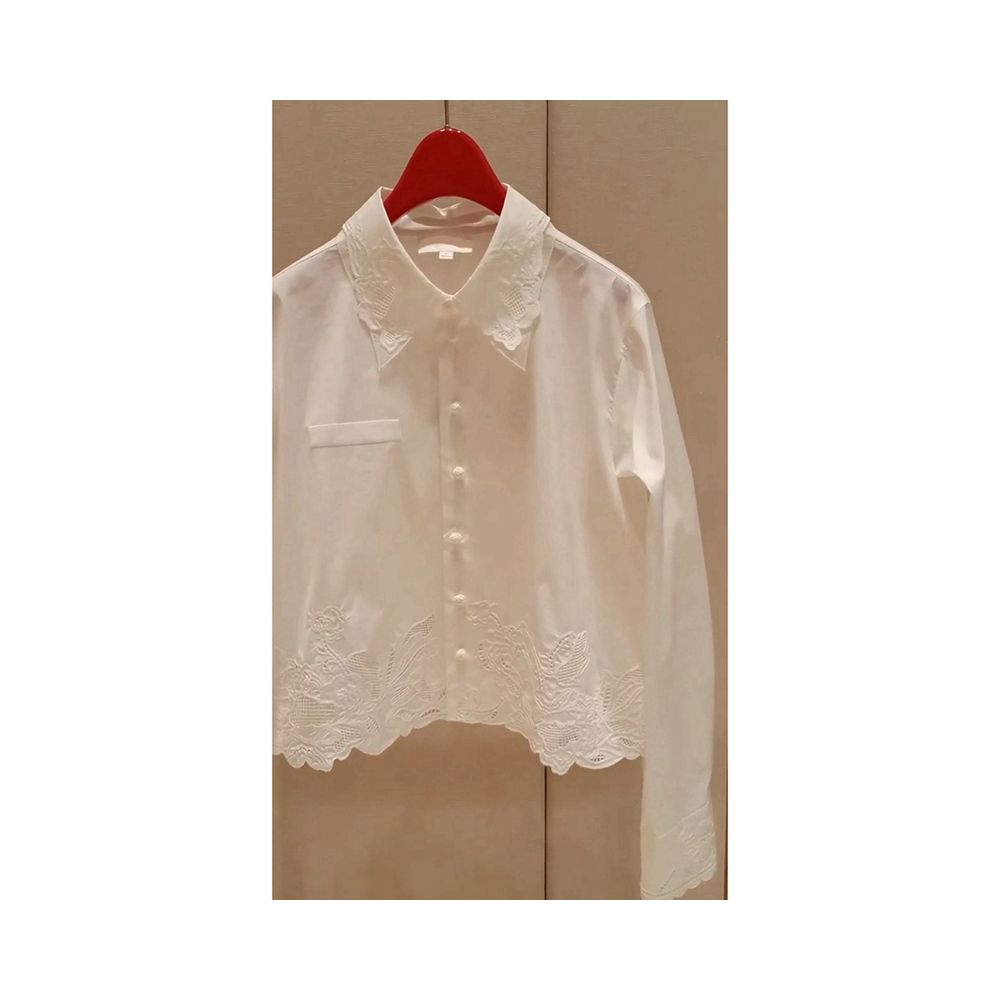 White embroidered shirt for women perfect for summer with a unique and stylish design A chic and sophisticated piece image 2