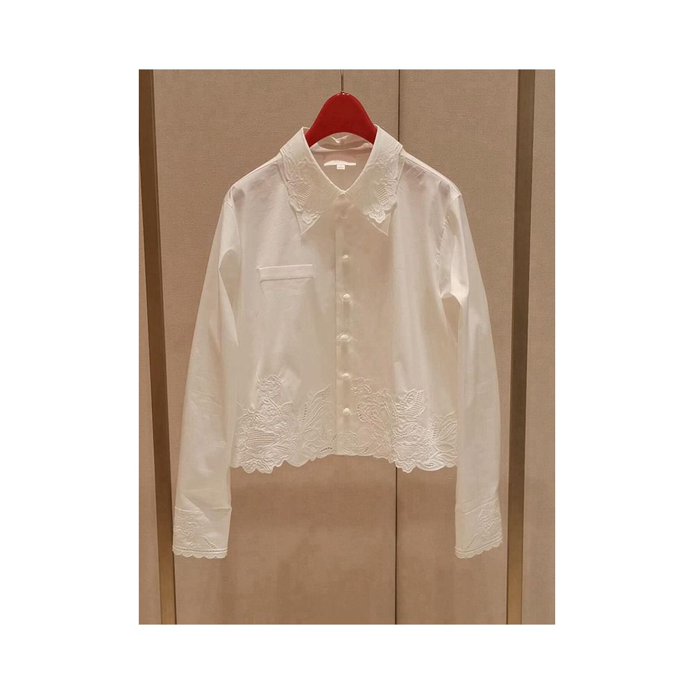 White embroidered shirt for women perfect for summer with a unique and stylish design A chic and sophisticated piece image 0