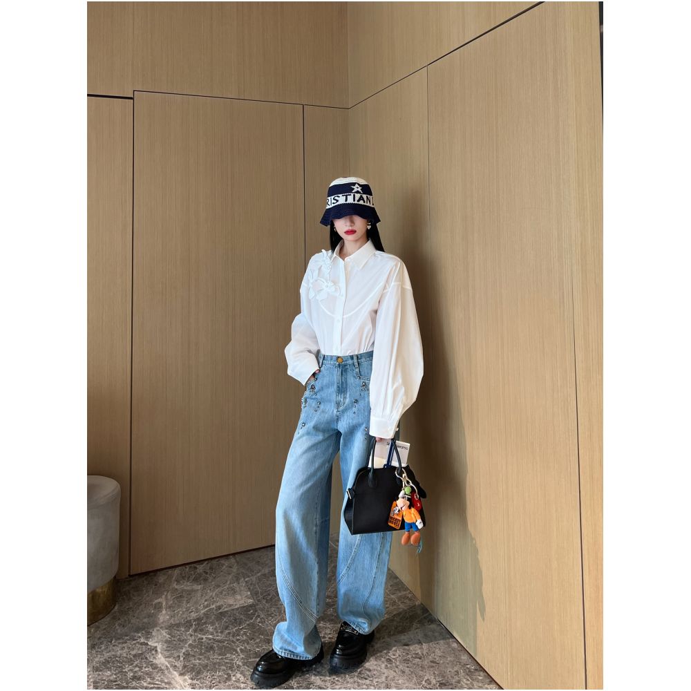 Nancy Cavally s exquisite and ultra soft cotton shirt with artistic and dynamic three dimensional floral silhouette at the counter image 3