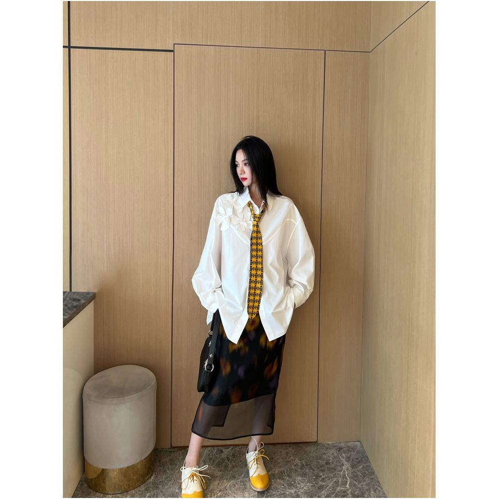 Nancy Cavally s exquisite and ultra soft cotton shirt with artistic and dynamic three dimensional floral silhouette at the counter image 4