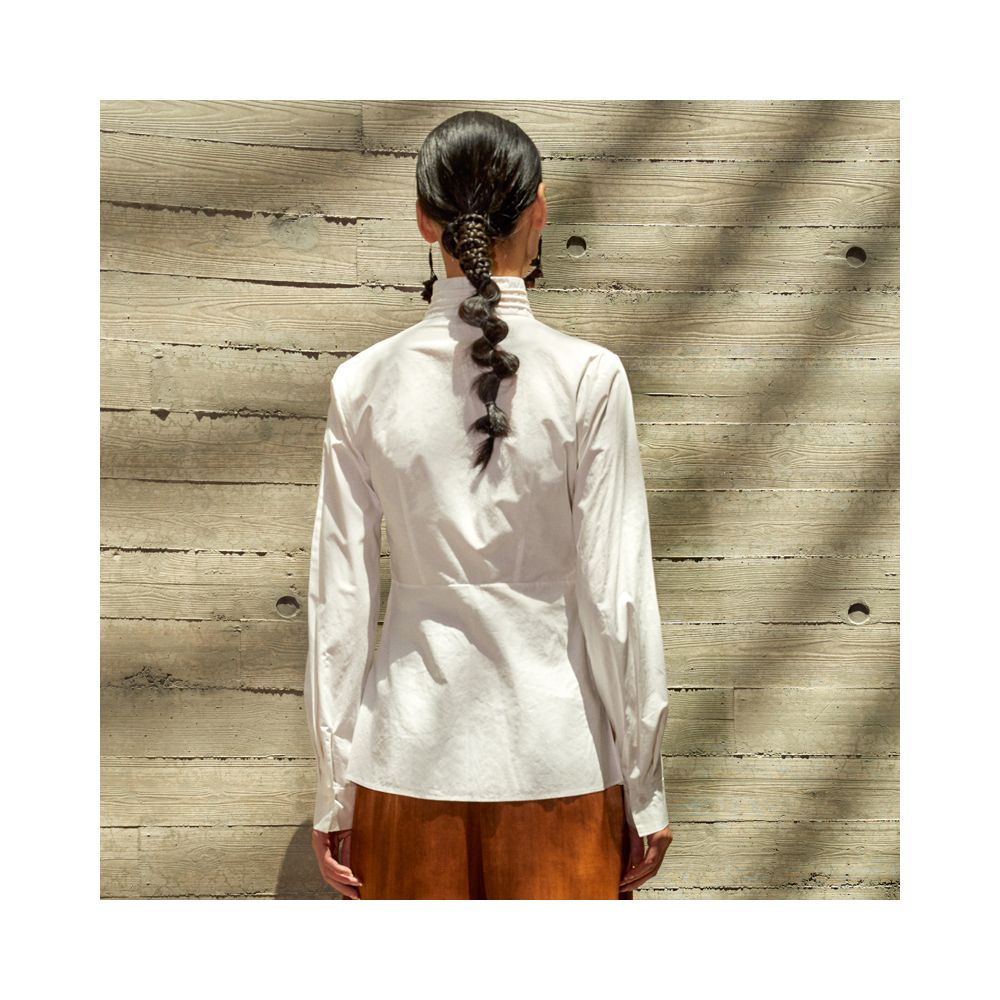 A white Chinese style shirt with a retro Chinese aesthetic featuring a V neck and a diagonal opening long sleeves perfect for spring and autumn image 3